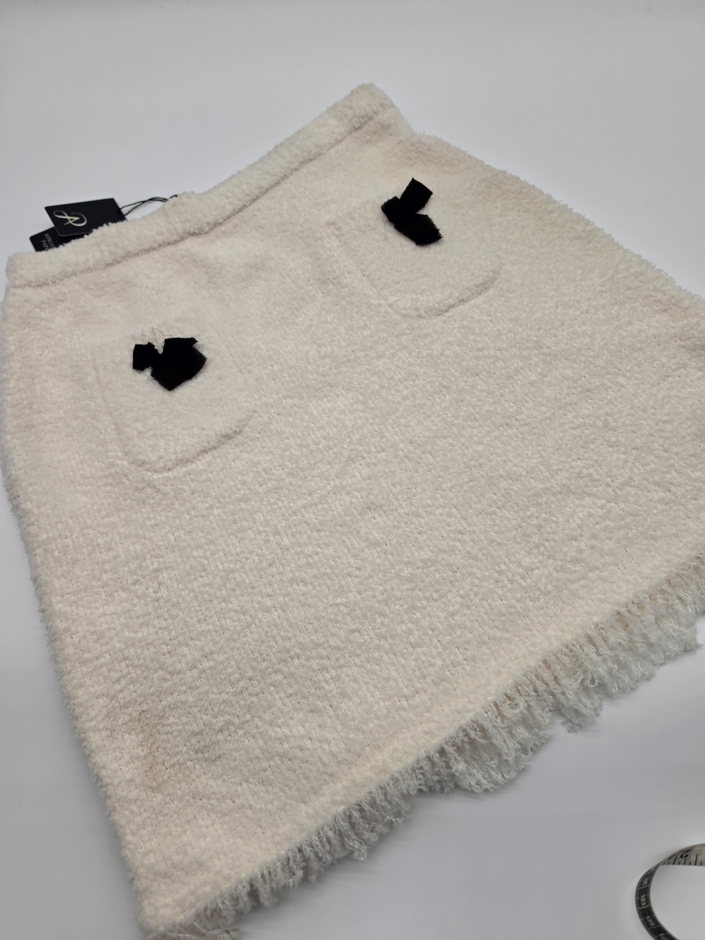 Adrianna Papell Cream Bouclé Mini Skirt with Black Bow Pockets - Picture 3 of 6